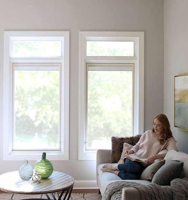 Woman enjoying a beautifully lit room